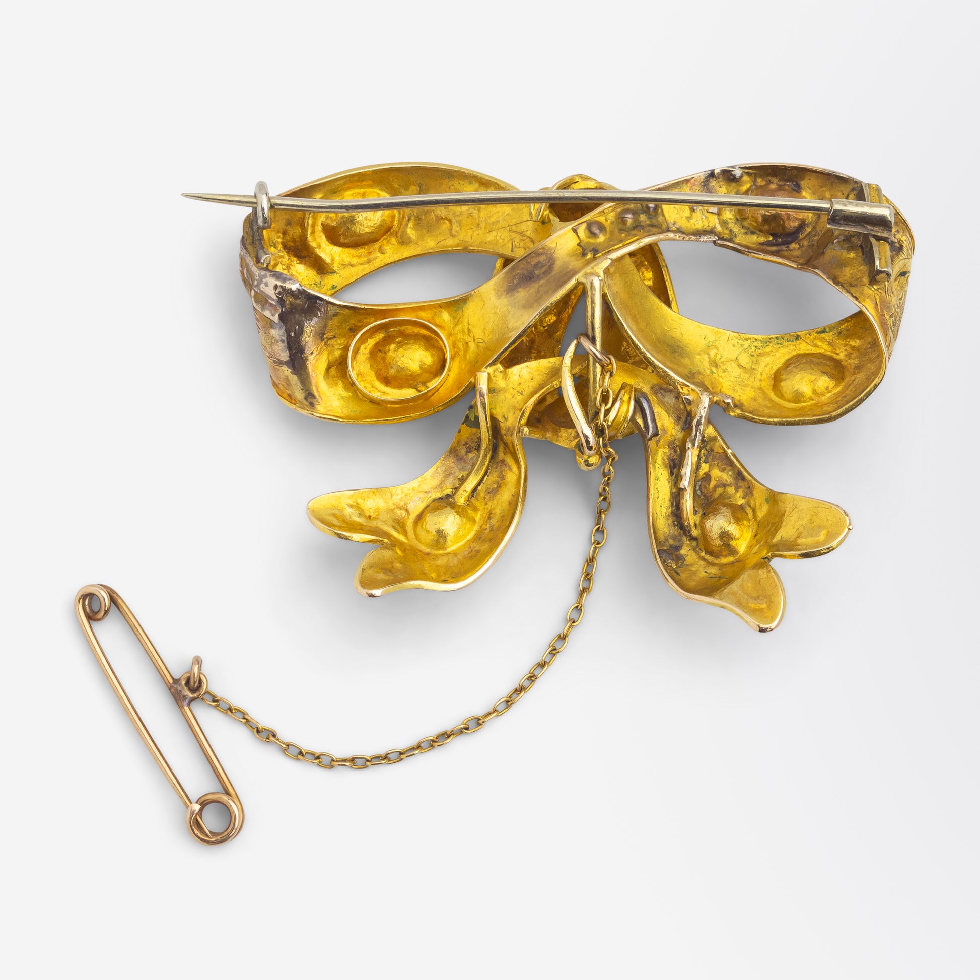 Broche nœud papillon en or et grenat de style colonial australien