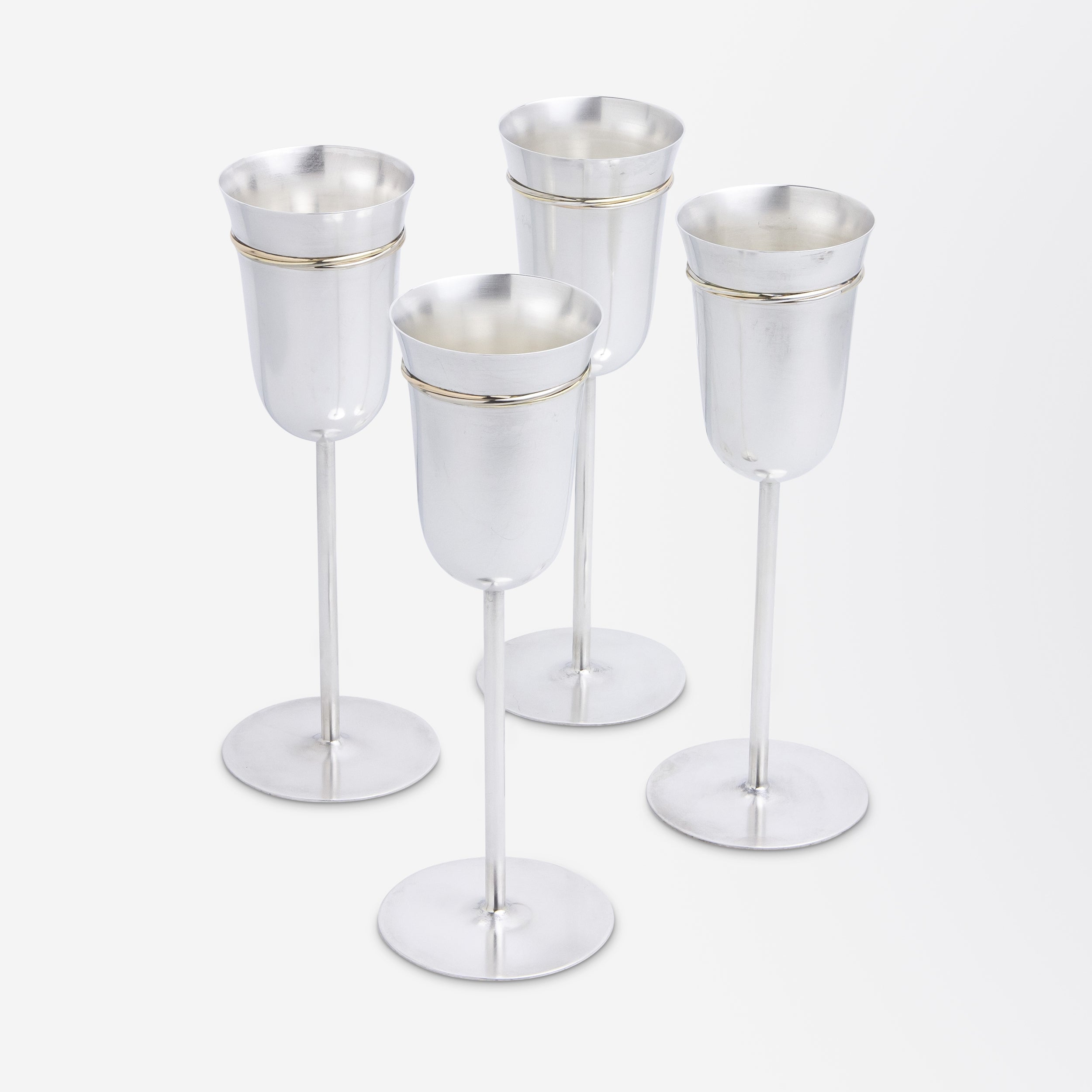 Set of Four Cartier 'Trinity' Sterling Silver Champagne Flutes