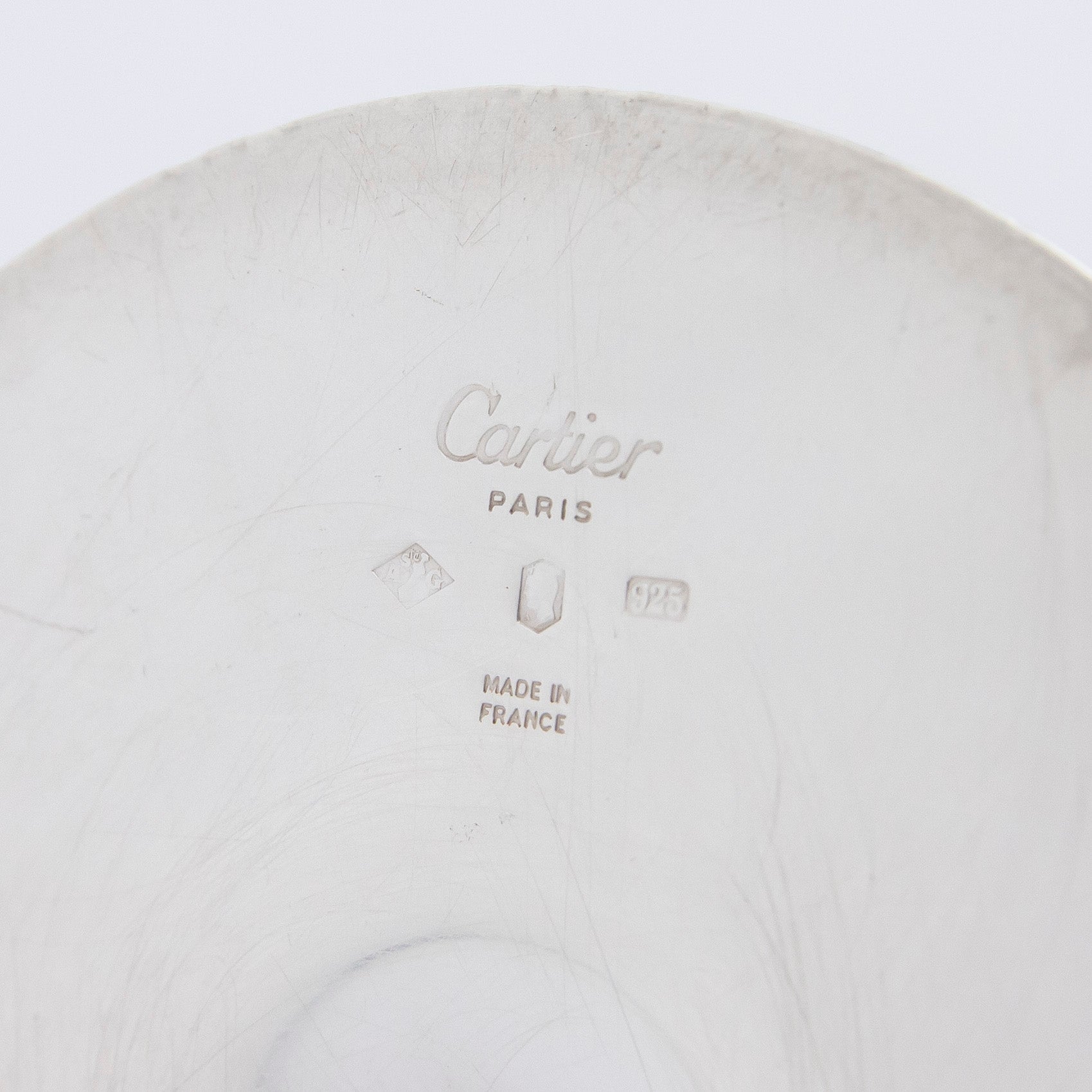 Ensemble de quatre flûtes à champagne Cartier « Trinity » en argent massif