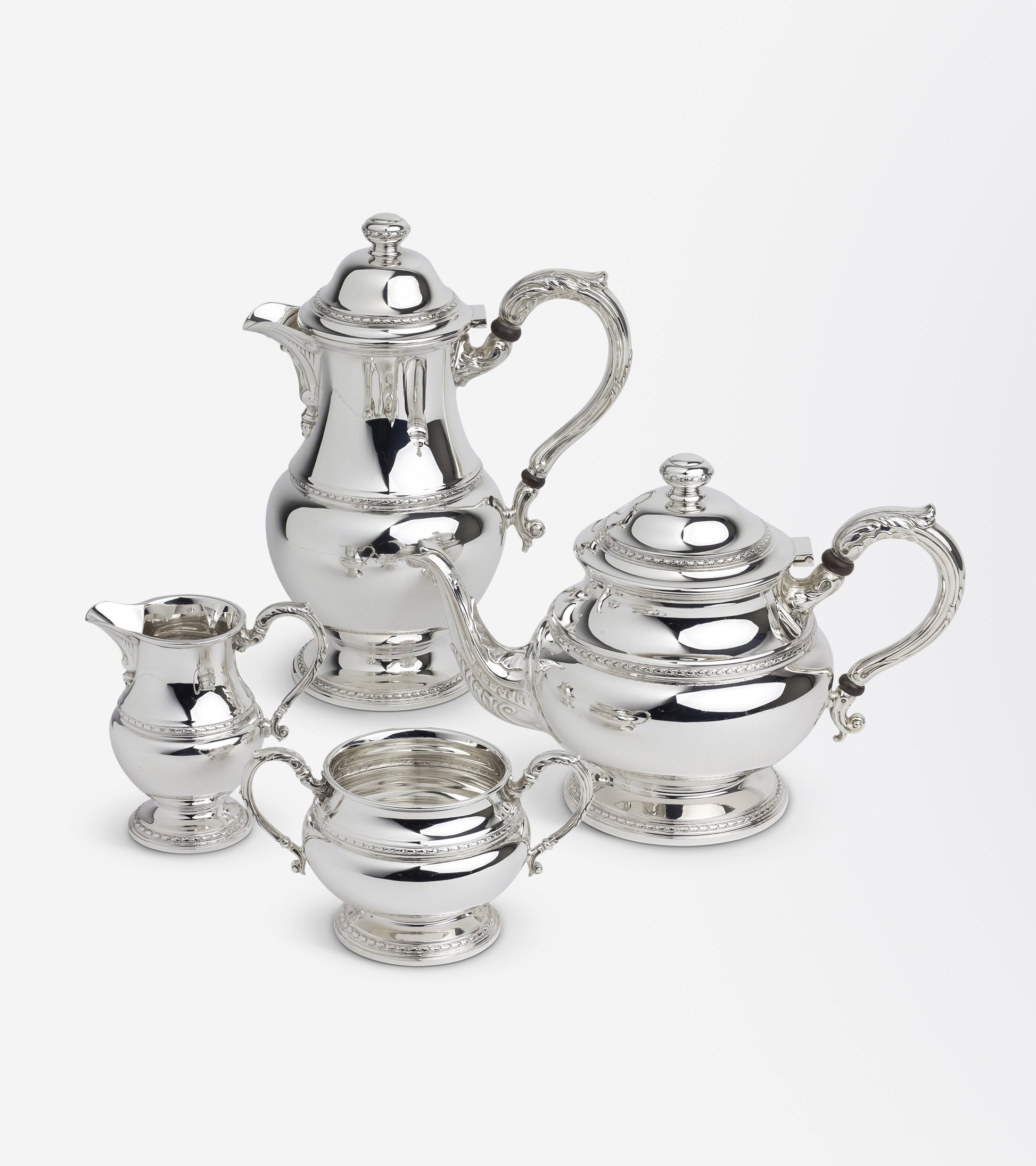 Sterling Silver Four Piece Tea Set by Goldsmiths and Silversmiths Co.