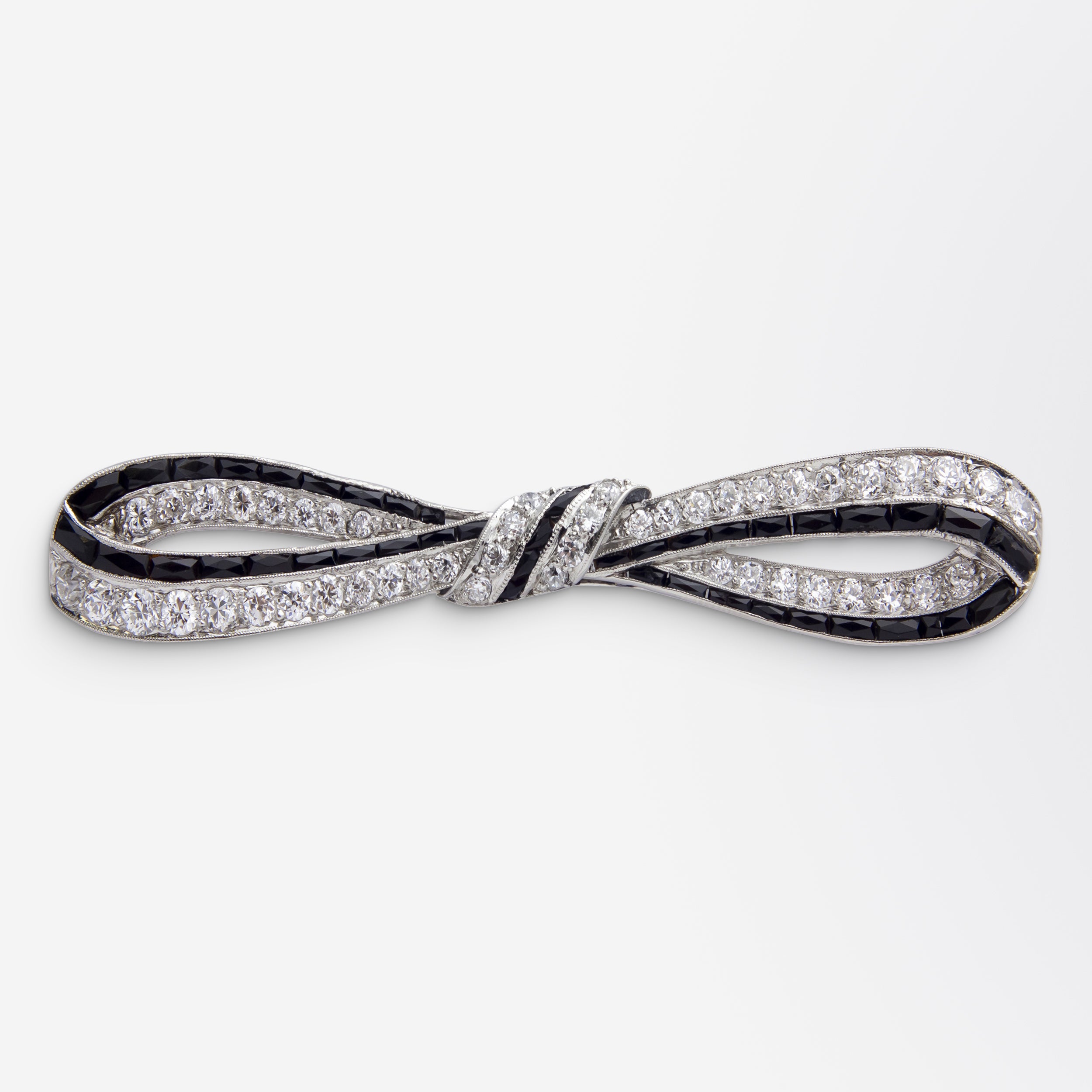 Art Deco, Platinum, Onyx & Diamond Bow Brooch