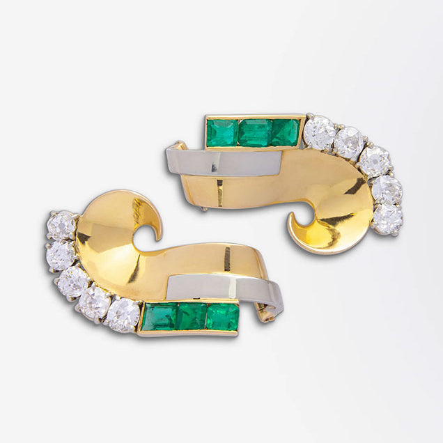 Paire de pinces à robe Art Déco françaises en émeraudes et diamants, probablement de Boucheron