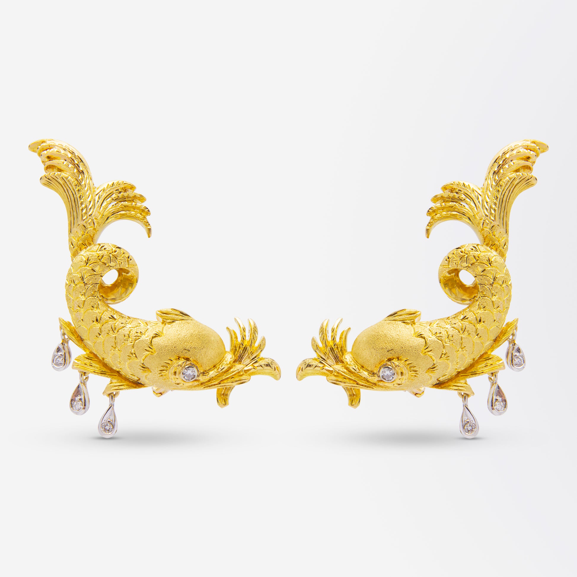 Clips d'oreilles « dauphin » en or jaune 18 carats avec diamants