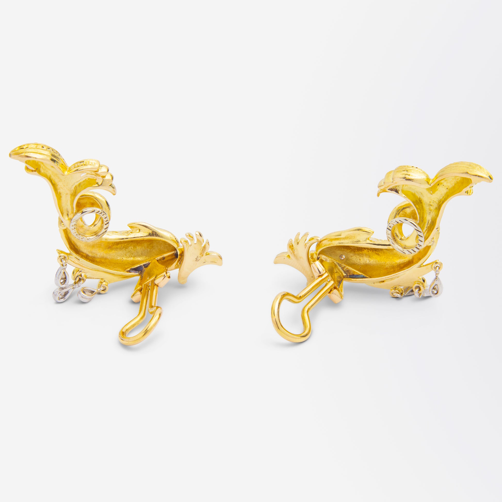 Clips d'oreilles « dauphin » en or jaune 18 carats avec diamants