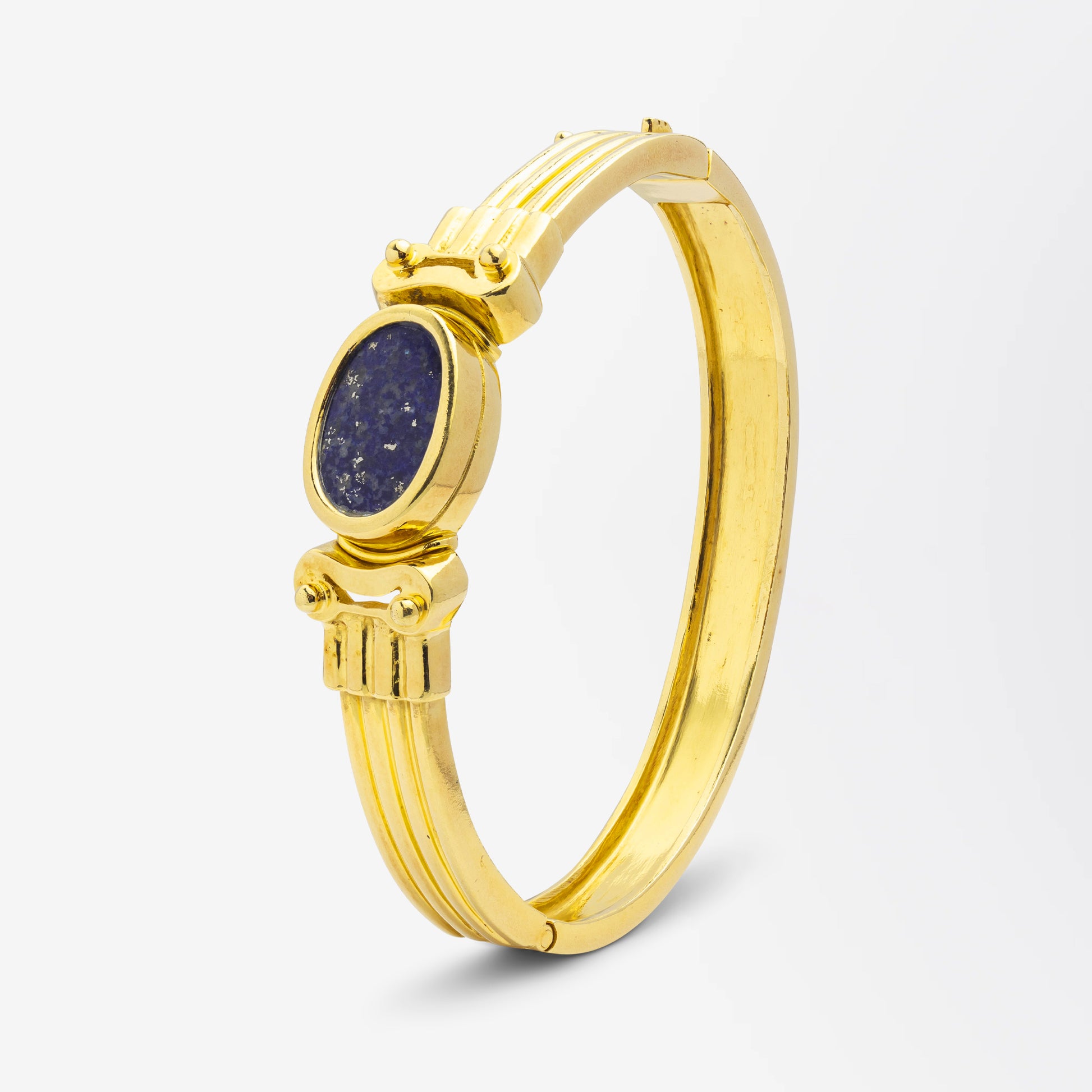 Bracelet grec en or 18 carats et lapis-lazuli