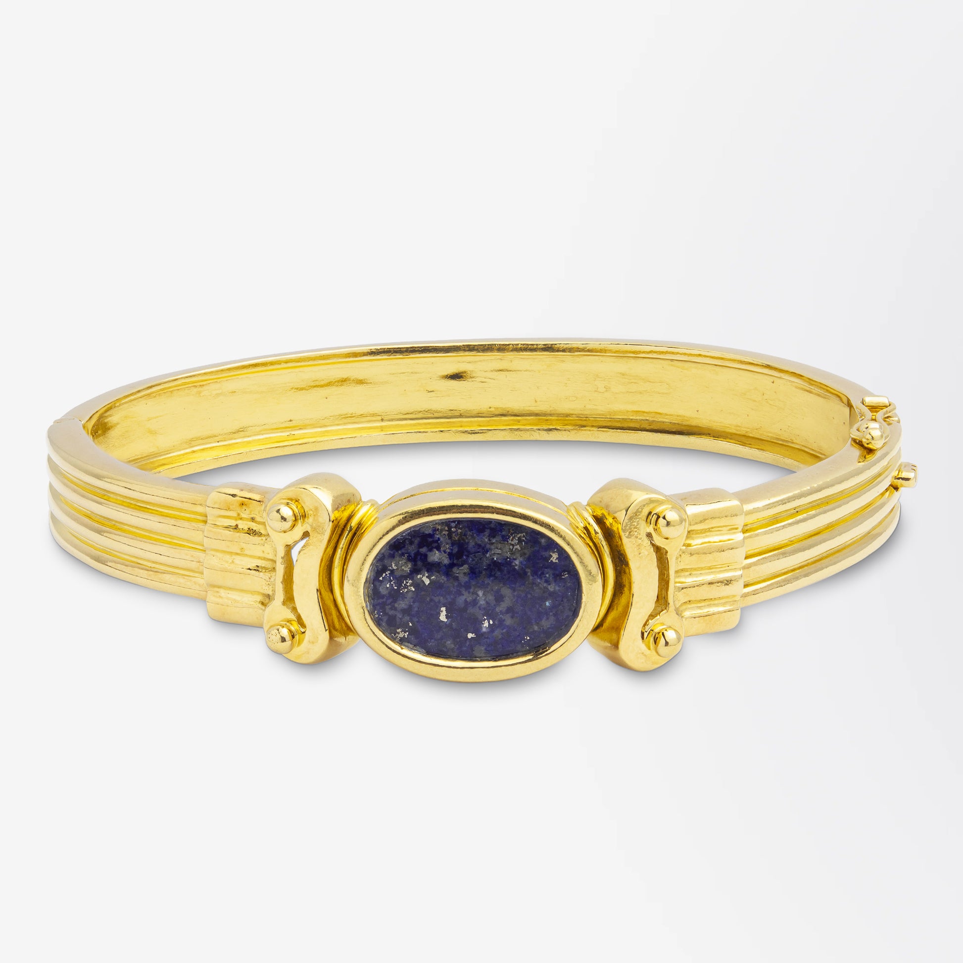 Bracelet grec en or 18 carats et lapis-lazuli