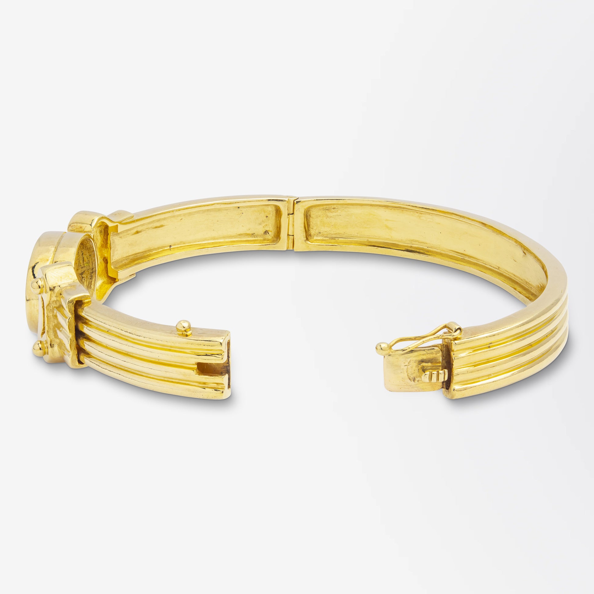 Bracelet grec en or 18 carats et lapis-lazuli