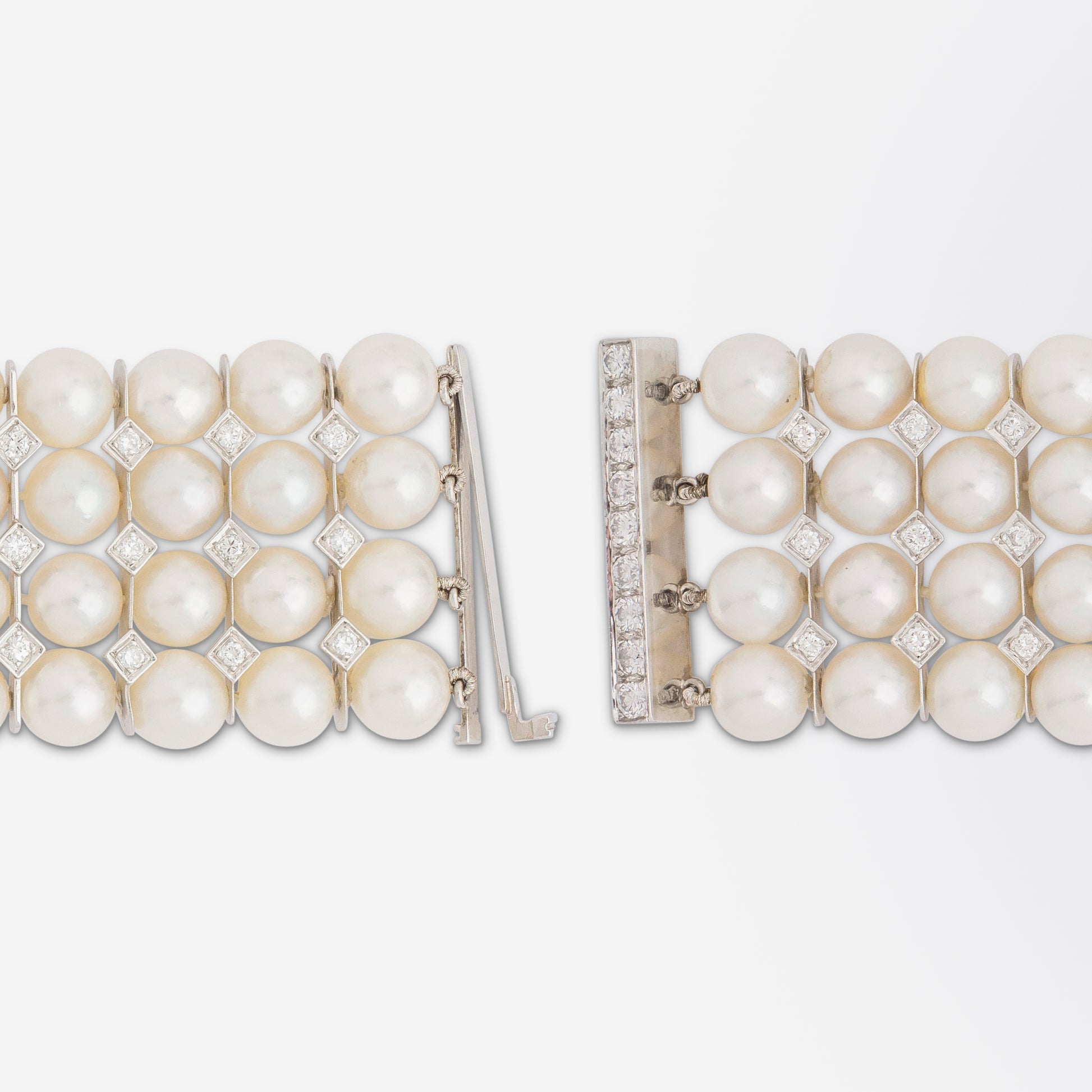 Impressive Diamond & Pearl Bracelet Set in Platinum Retailed by David R. Balogh