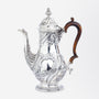 George II Period Sterling Silver Coffee Pot with Floral Repousse