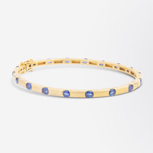 Load image into Gallery viewer, 14kt Yellow Gold &amp; Ceylon Sapphire Hinged Bangle
