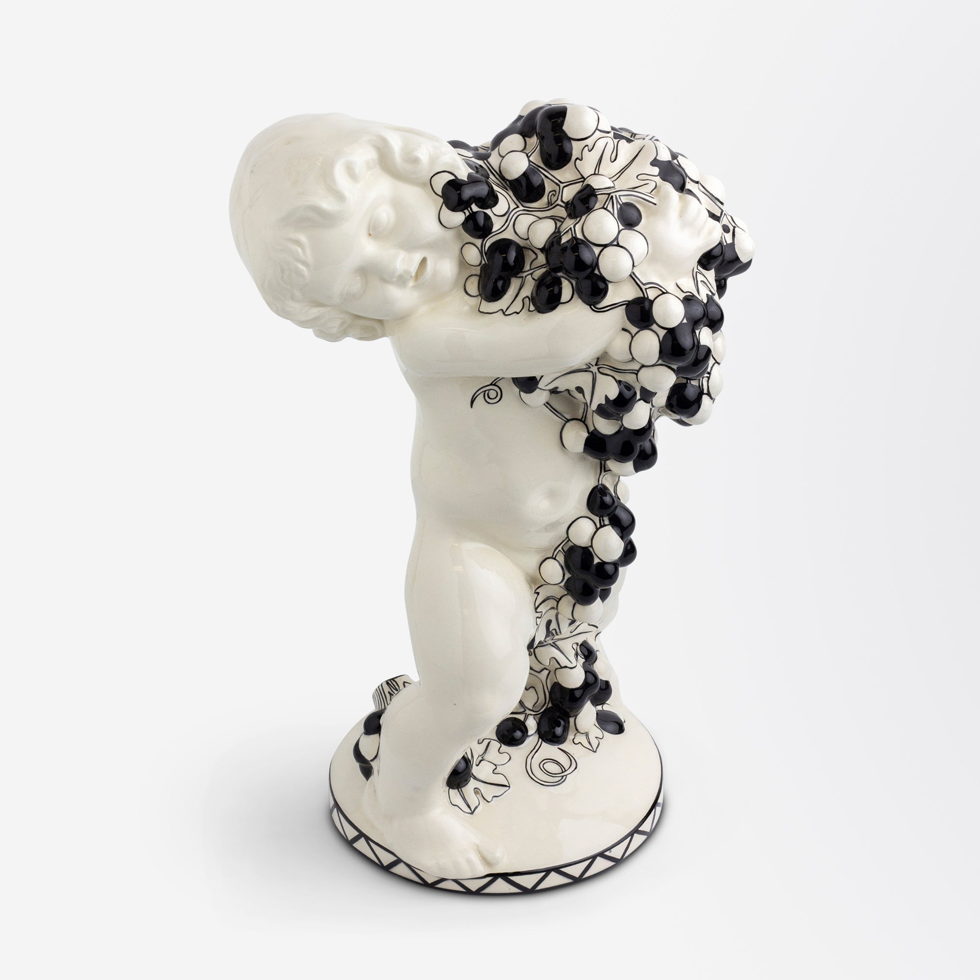 Ceramic Putto with Grapes by Michael Powolny for Gmunder Keramische Werkstatte