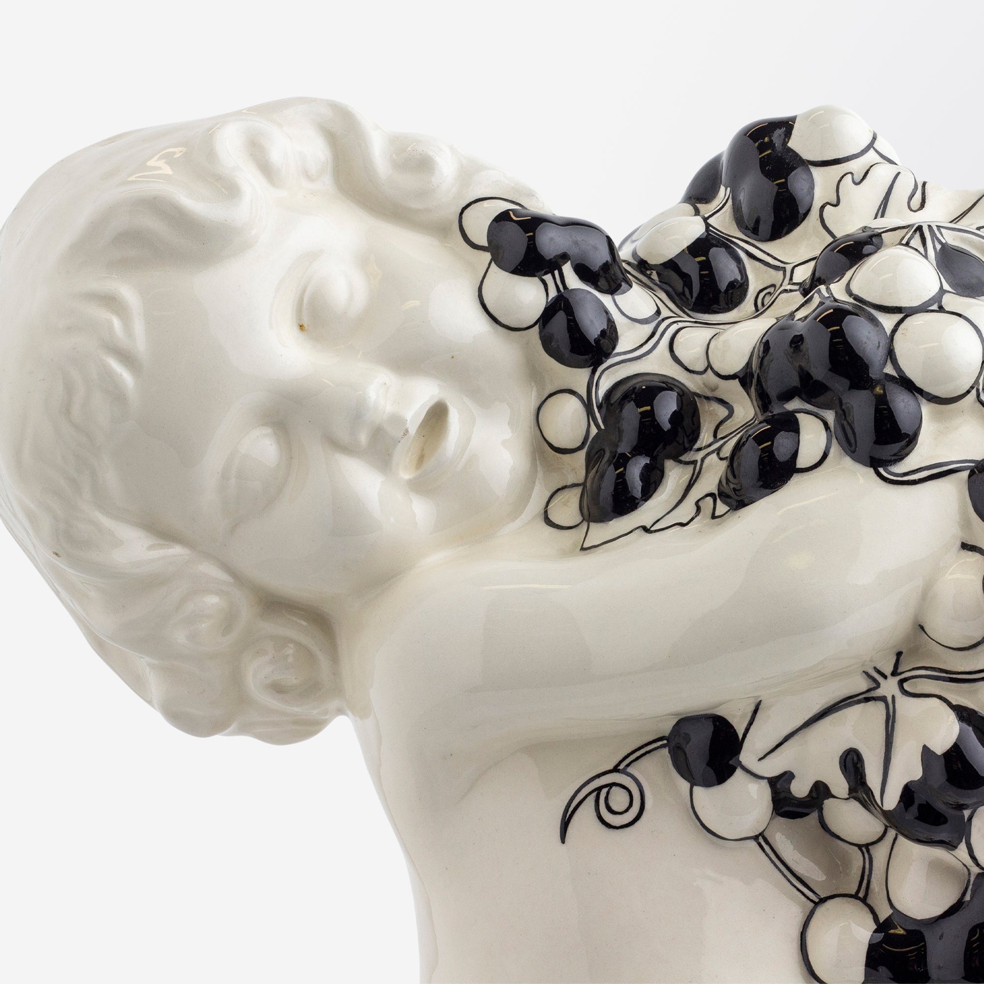 Ceramic Putto with Grapes by Michael Powolny for Gmunder Keramische Werkstatte