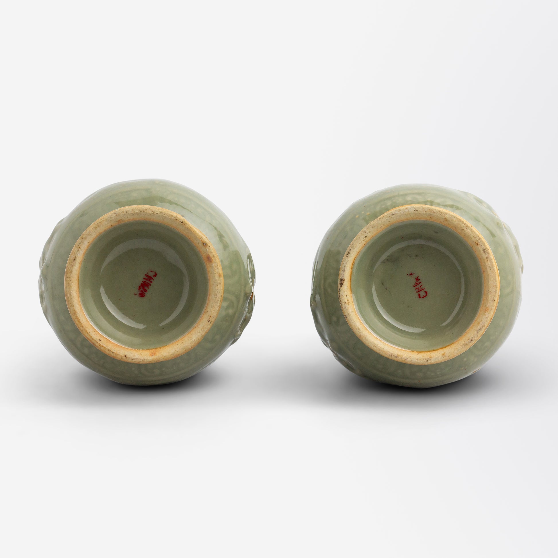 Pair of Celadon Vases in the Yuhuchunping Shape with Handles