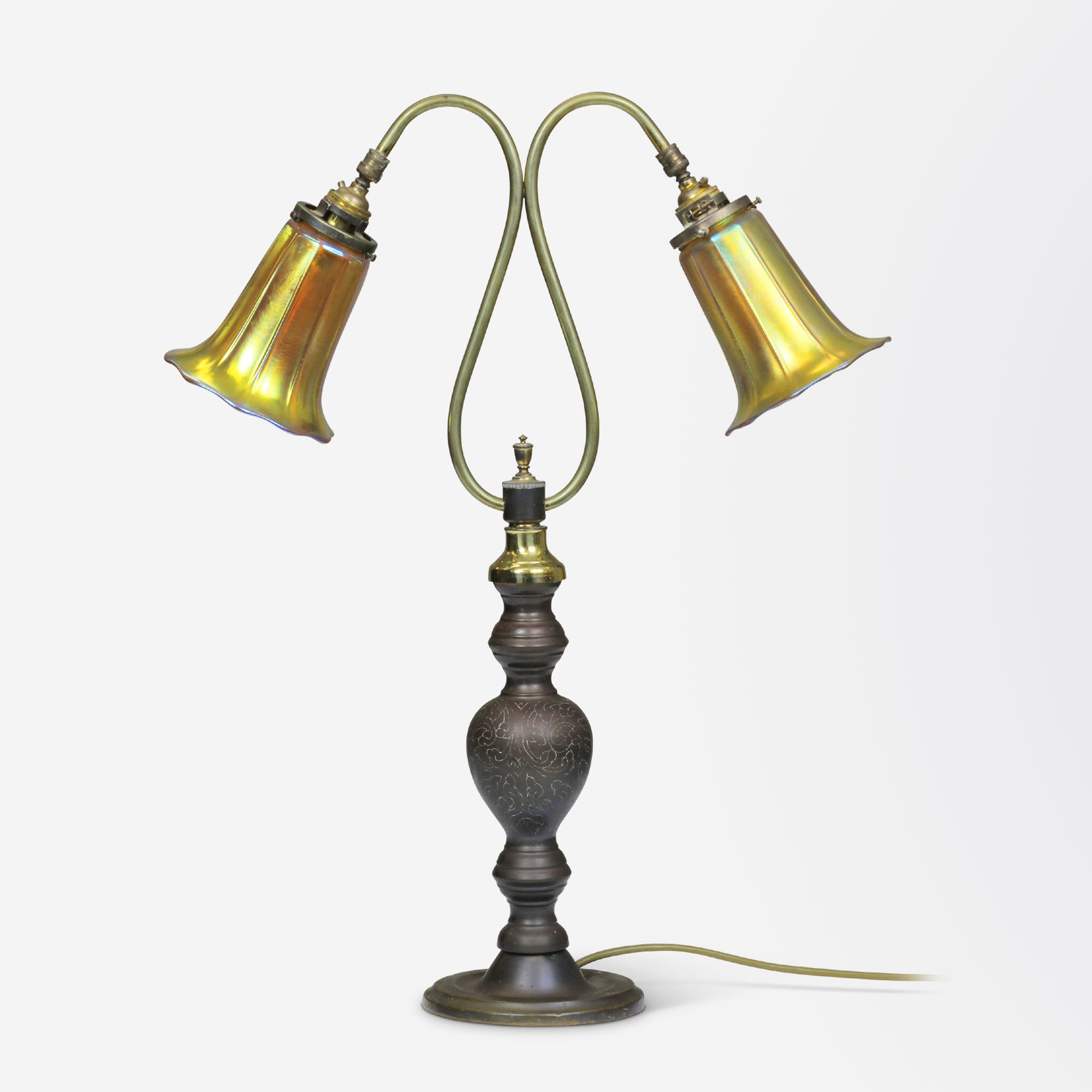 An Art Deco Bronze Table Lamp with Tiffany Style Glass Shades