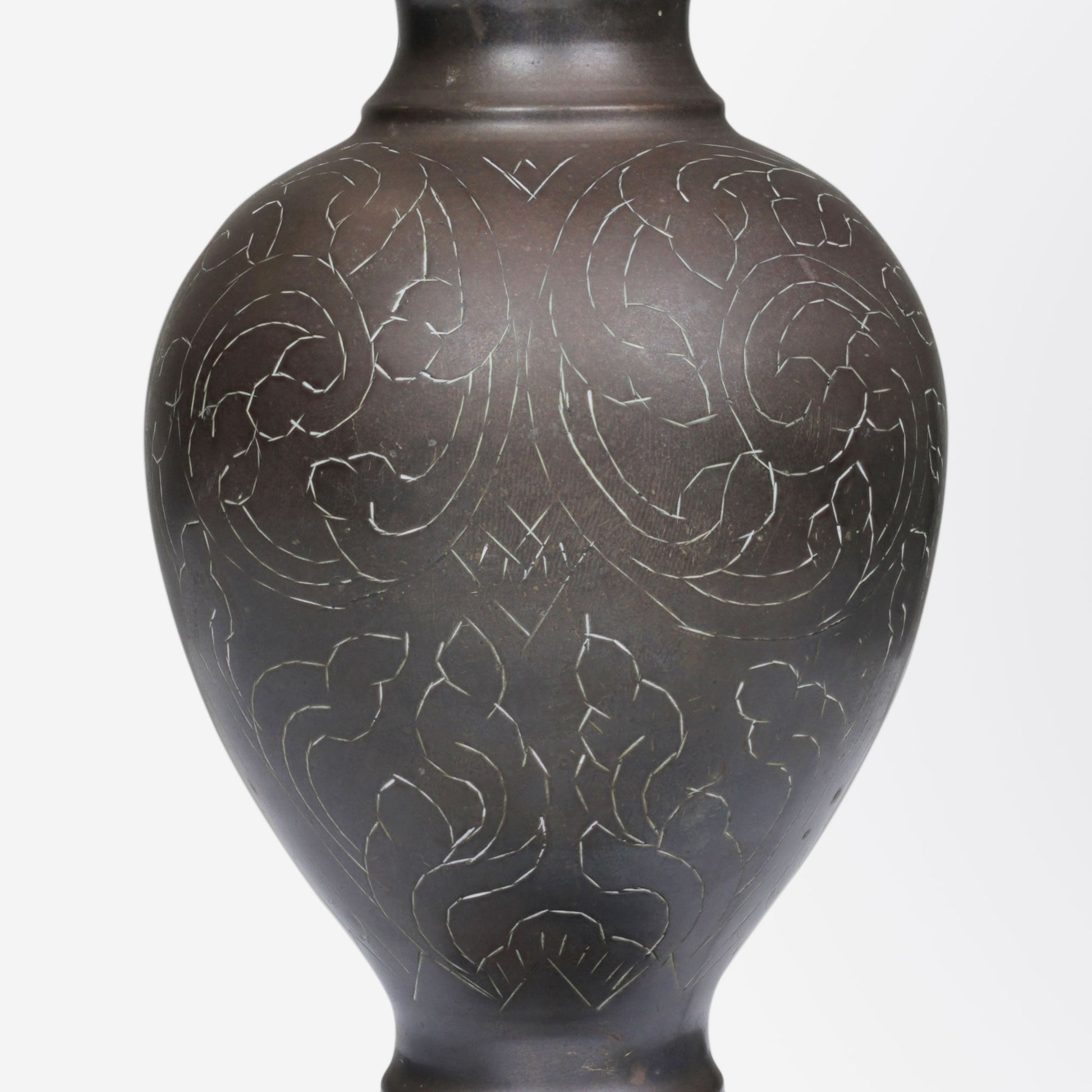 An Art Deco Bronze Table Lamp with Tiffany Style Glass Shades