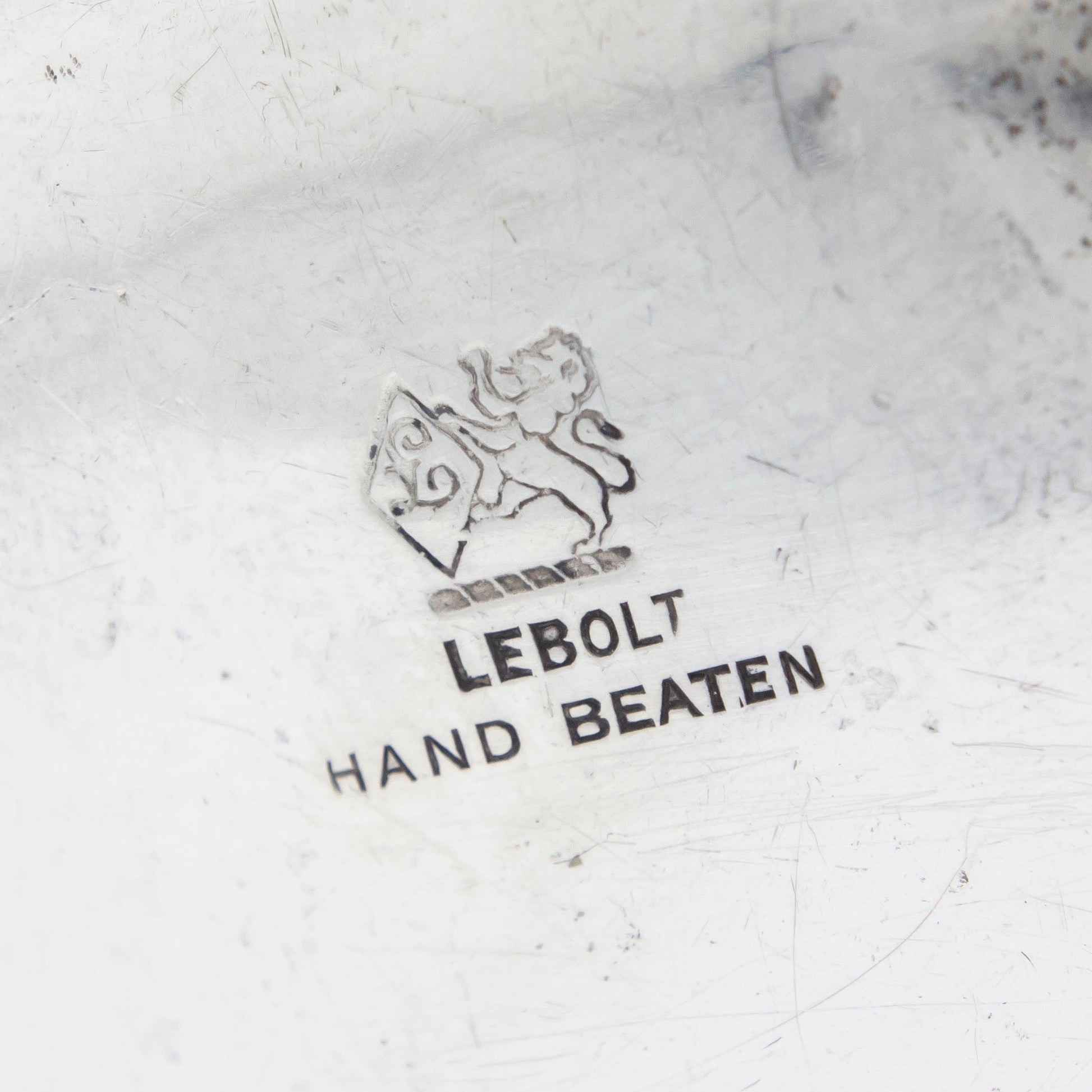 A Hand Wrought Sterling Silver Bowl with Serving Spoon by Lebolt & Co.