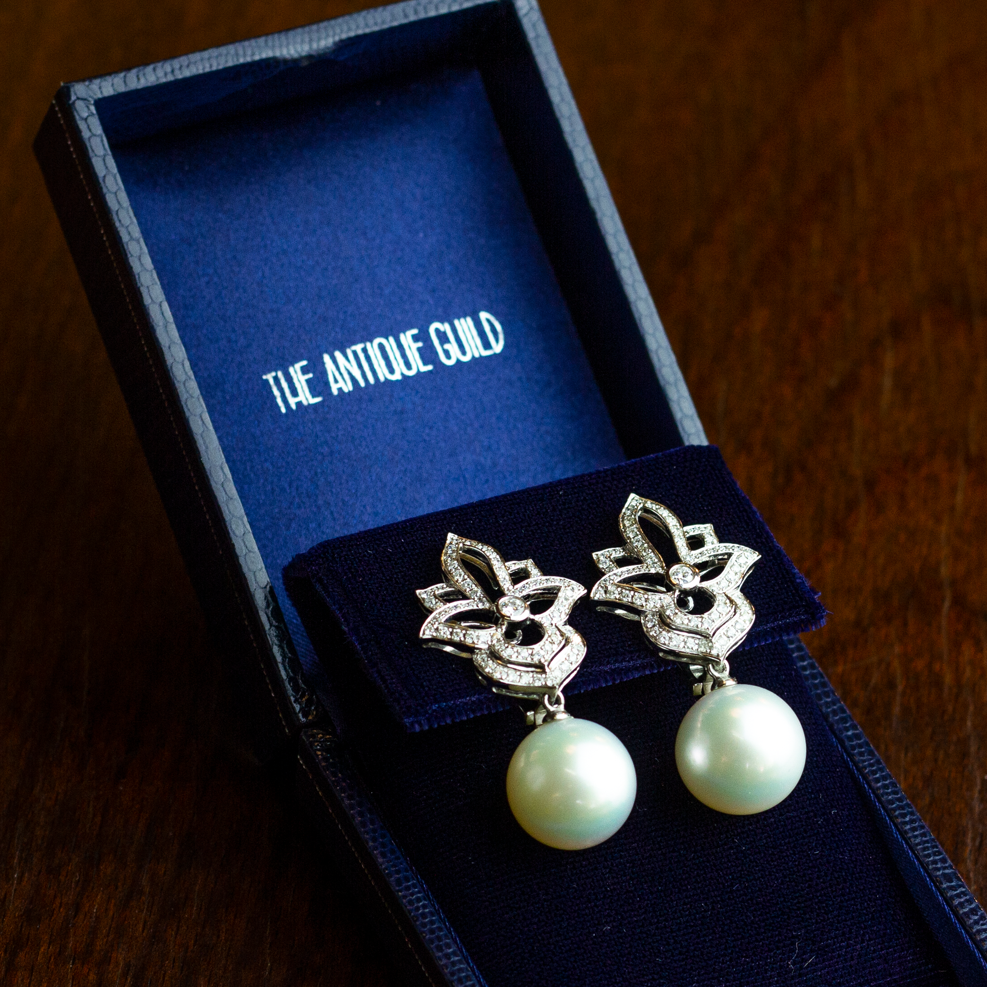 18kt White Gold, Diamond, and South Sea Pearl Earrings