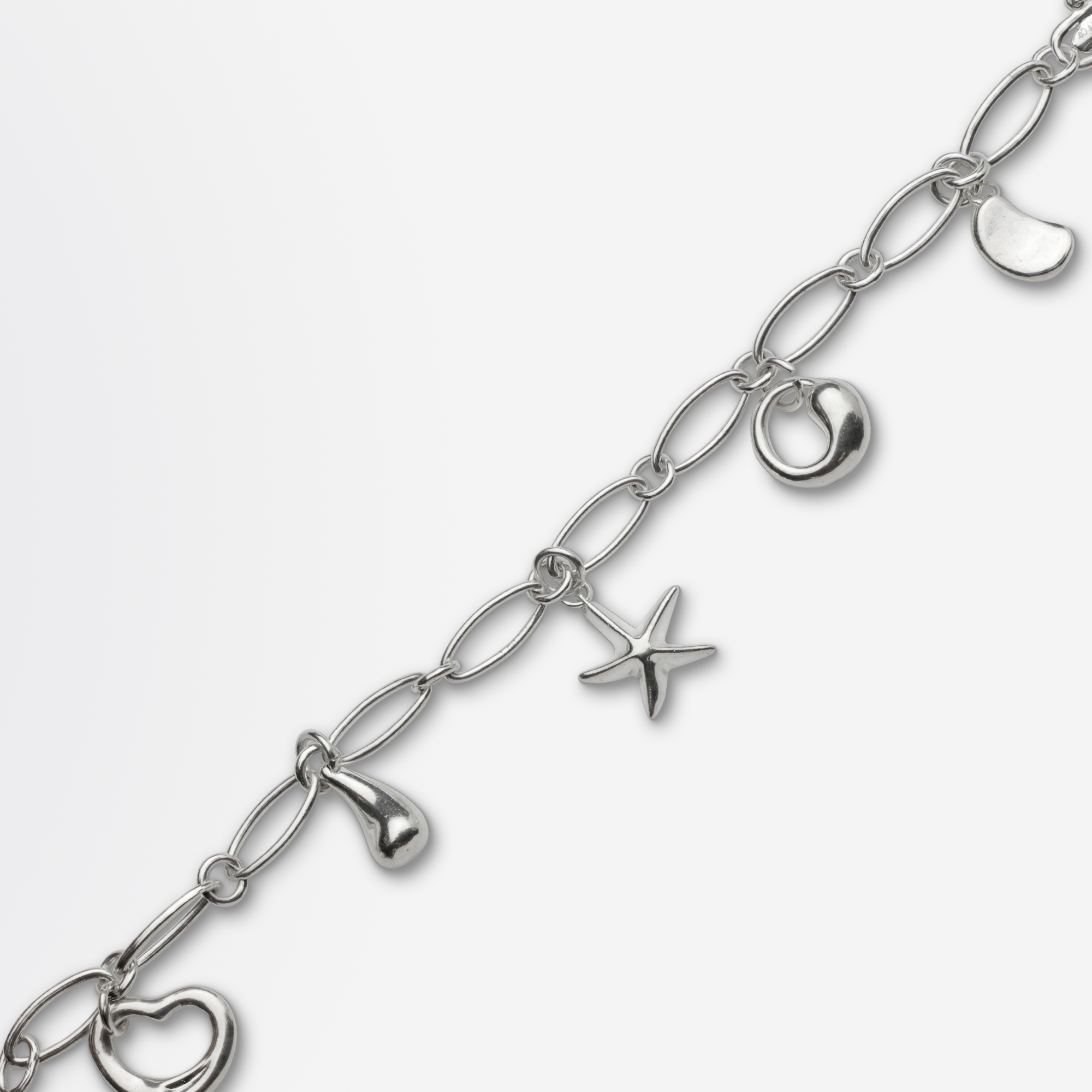 Tiffany silver charms for 2025 bracelet