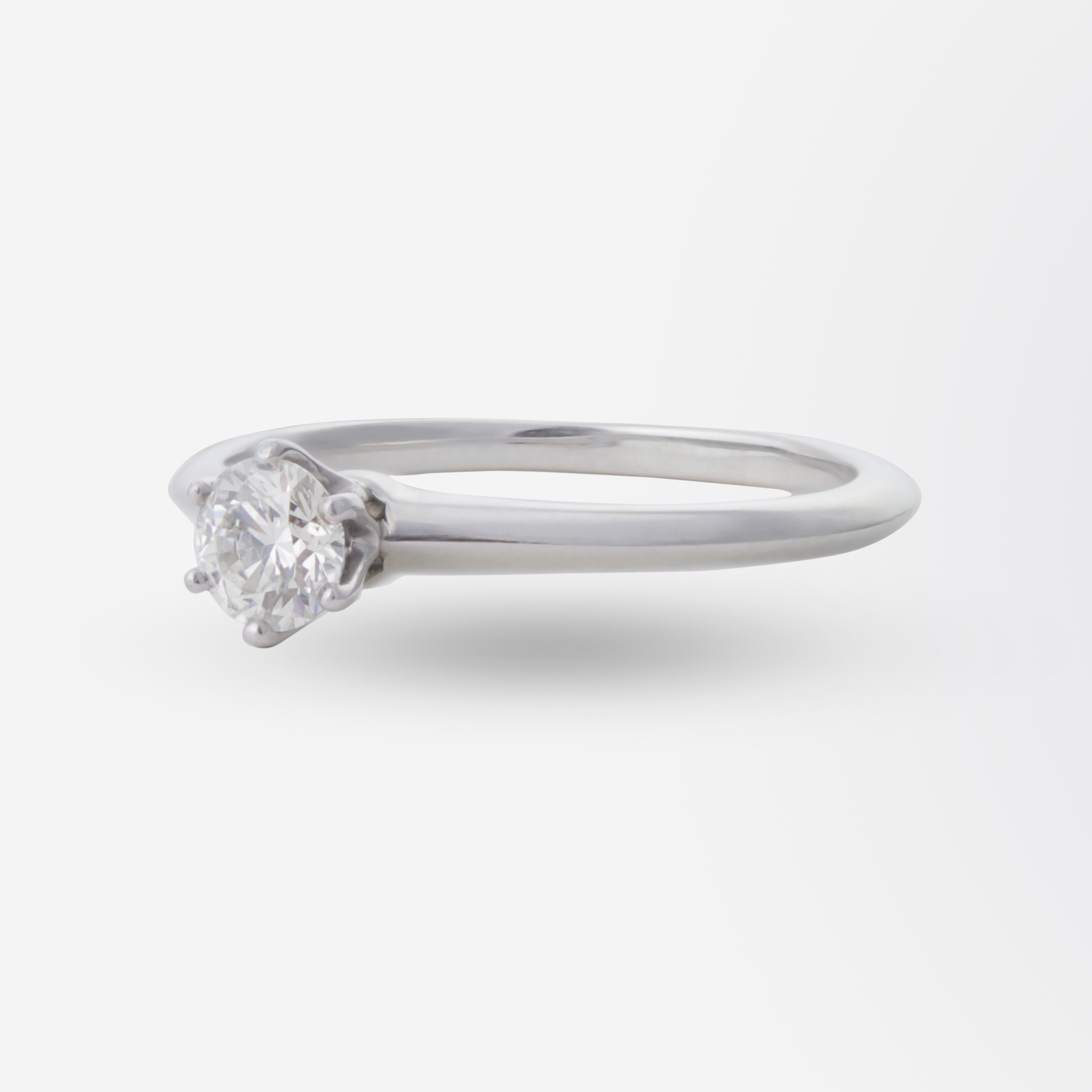 Platinum and Solitaire Diamond Ring by Tiffany and Company